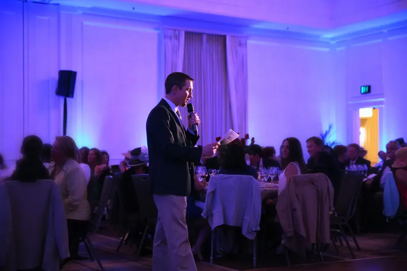 Auctioneer on the PA system at the 2014 Boys & Girls Club gala