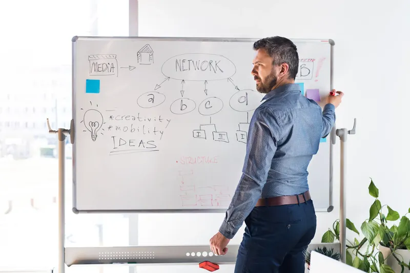 businessman in the office writing notes on PDDVPAH